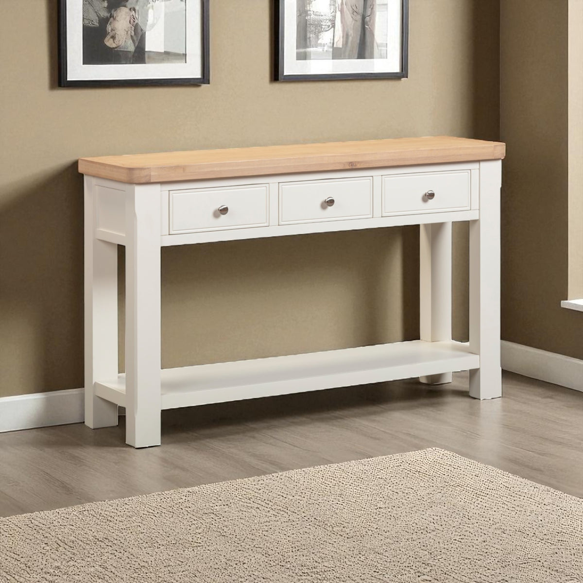 White console table with wooden top against a beige wall