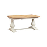 Wooden table with white base on a white background