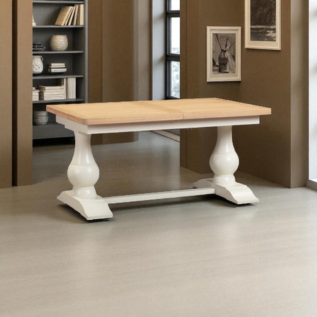 Wooden table with white base in a room setting