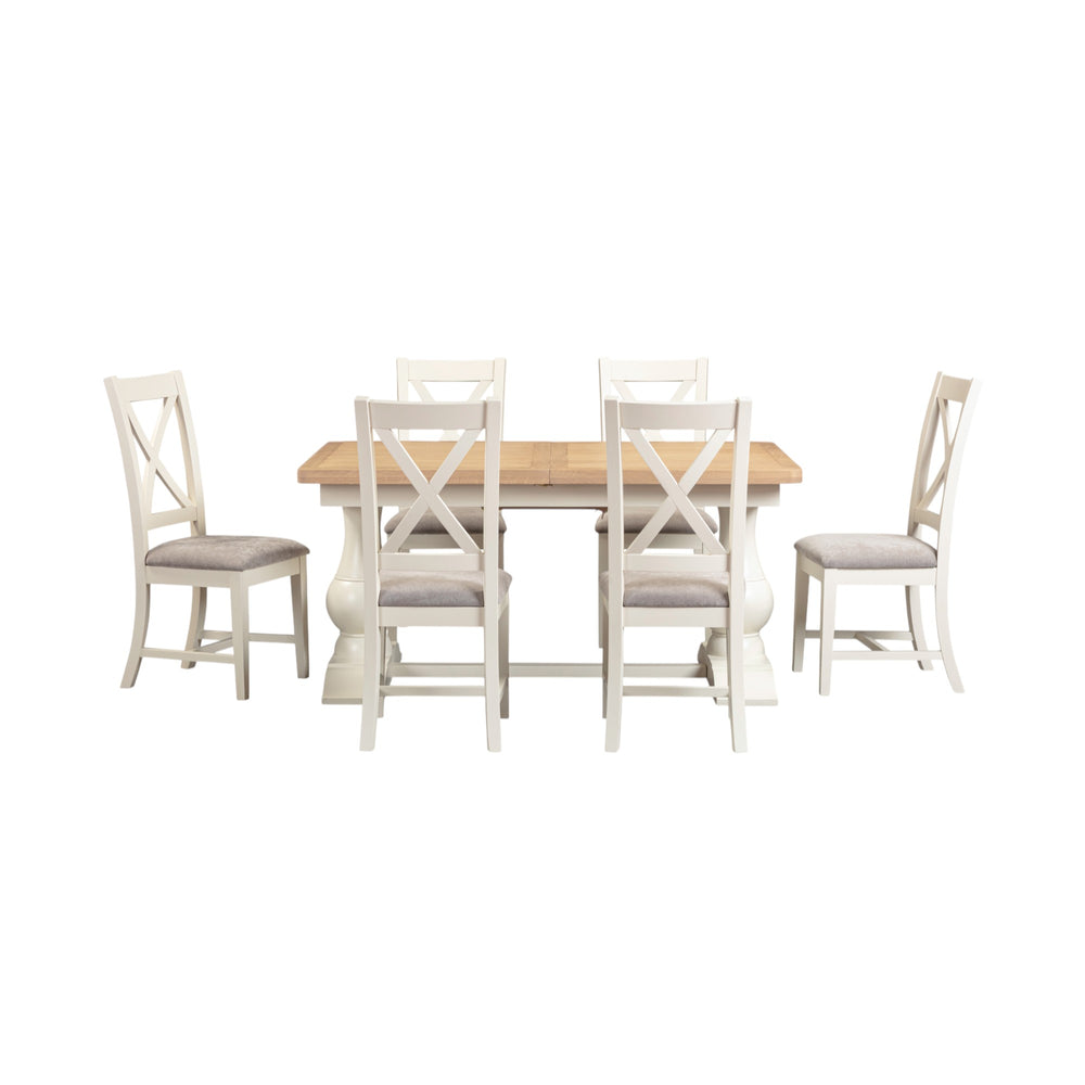 Dining table set with four chairs on a white background