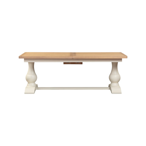 Wooden table with white base on a white background