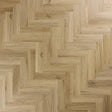 weathered cedar laminate flooring in herringbone pattern with natural wood grain texture
