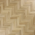 Weathered cedar herringbone wood flooring with natural grain in close detail