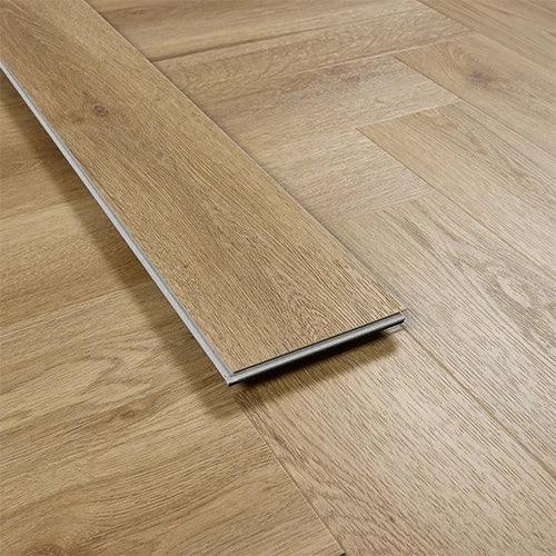 Weathered cedar wood flooring plank close-up on herringbone patterned floor
