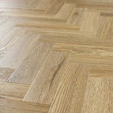Weathered cedar wood flooring with herringbone pattern and natural grain detail