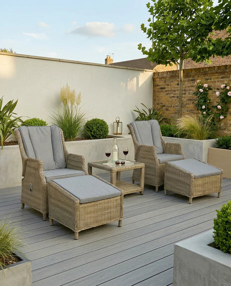 Wentworth recliner chair set with footstools and grey cushions on a modern patio