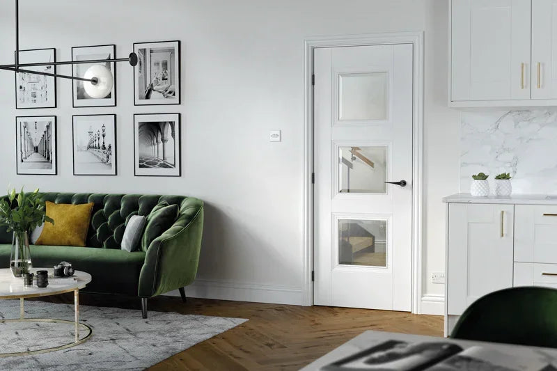 White Amsterdam glazed door with three glass panels in modern living room setting