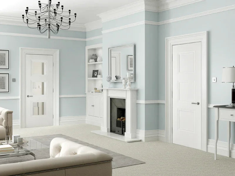 White Amsterdam interior door with panel design in a light blue living room