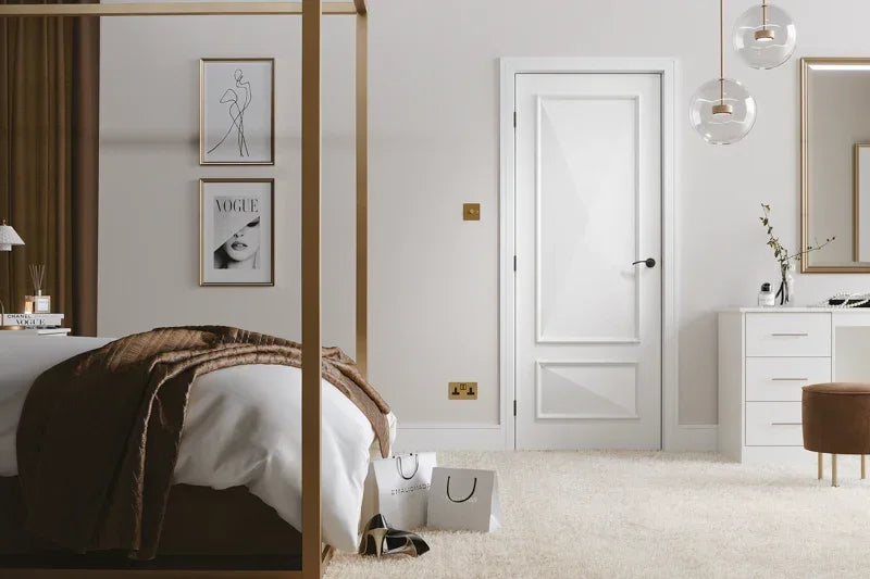 White Knighstbridge 2 panel interior door in modern bedroom with gold accents and neutral decor