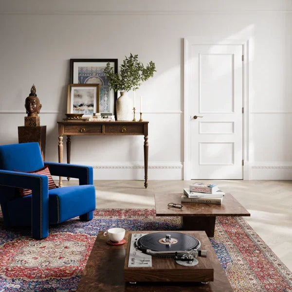 White Toledo coffee table with vinyl player on patterned rug in stylish living room