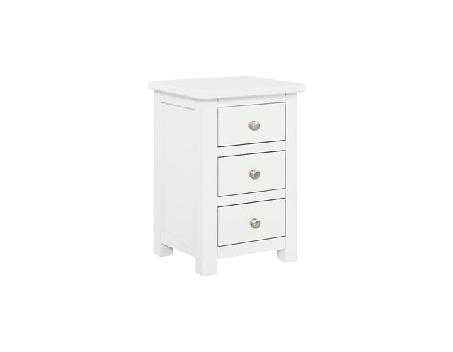 White bedside locker with three drawers and silver handles, angled front view