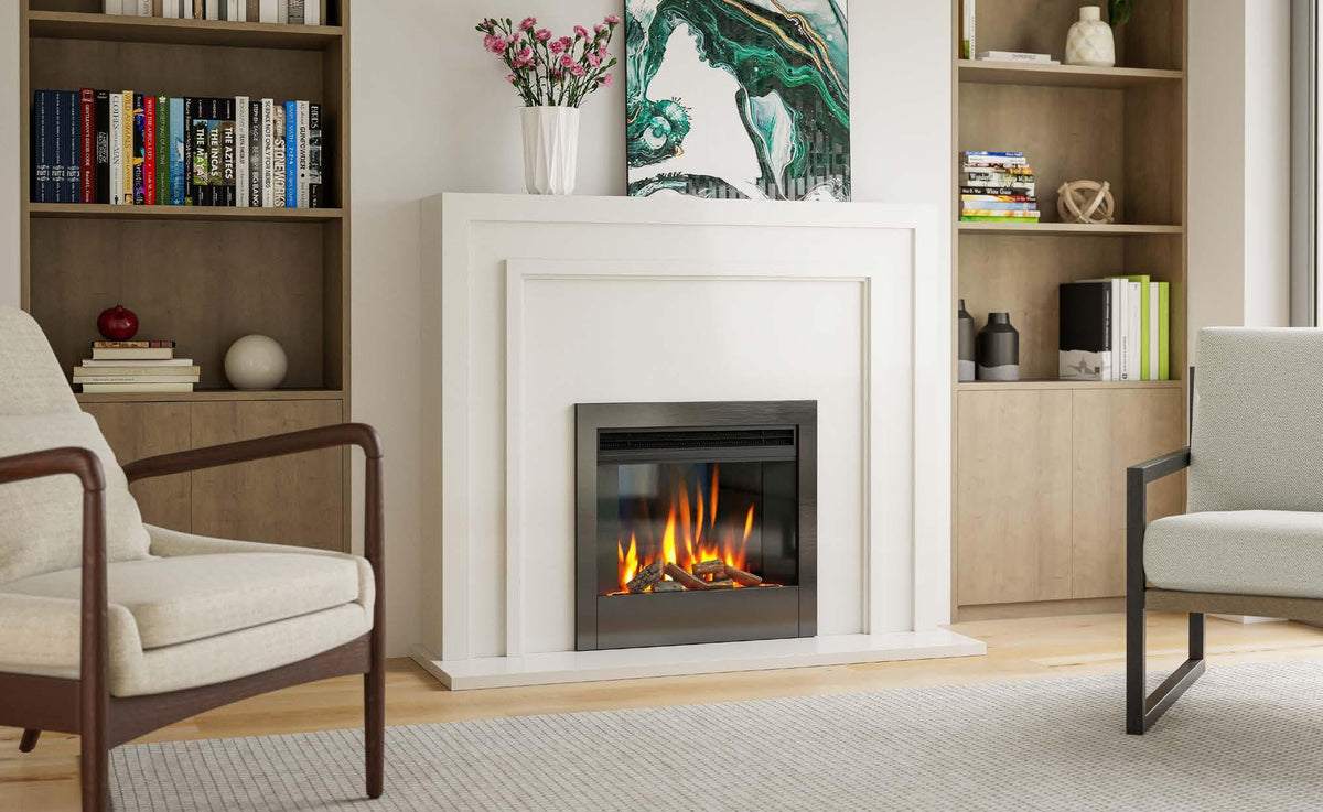 Modern electric fireplace set in white mantle with bookshelves and contemporary armchairs