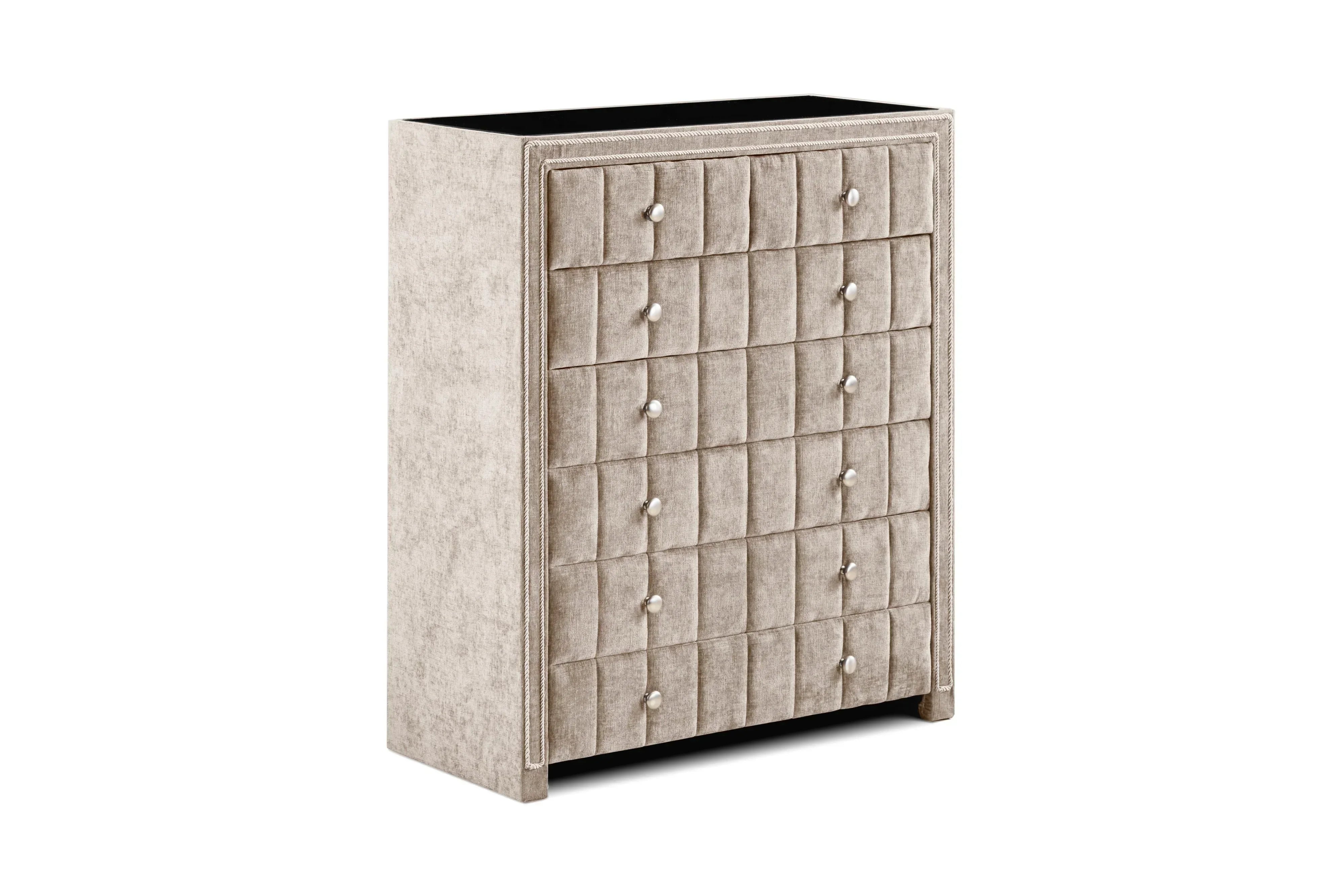 Beige upholstered chest of drawers with grid tufted front and round drawer handles