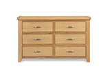 Oak chest of drawers with six compartments and silver handles, front view
