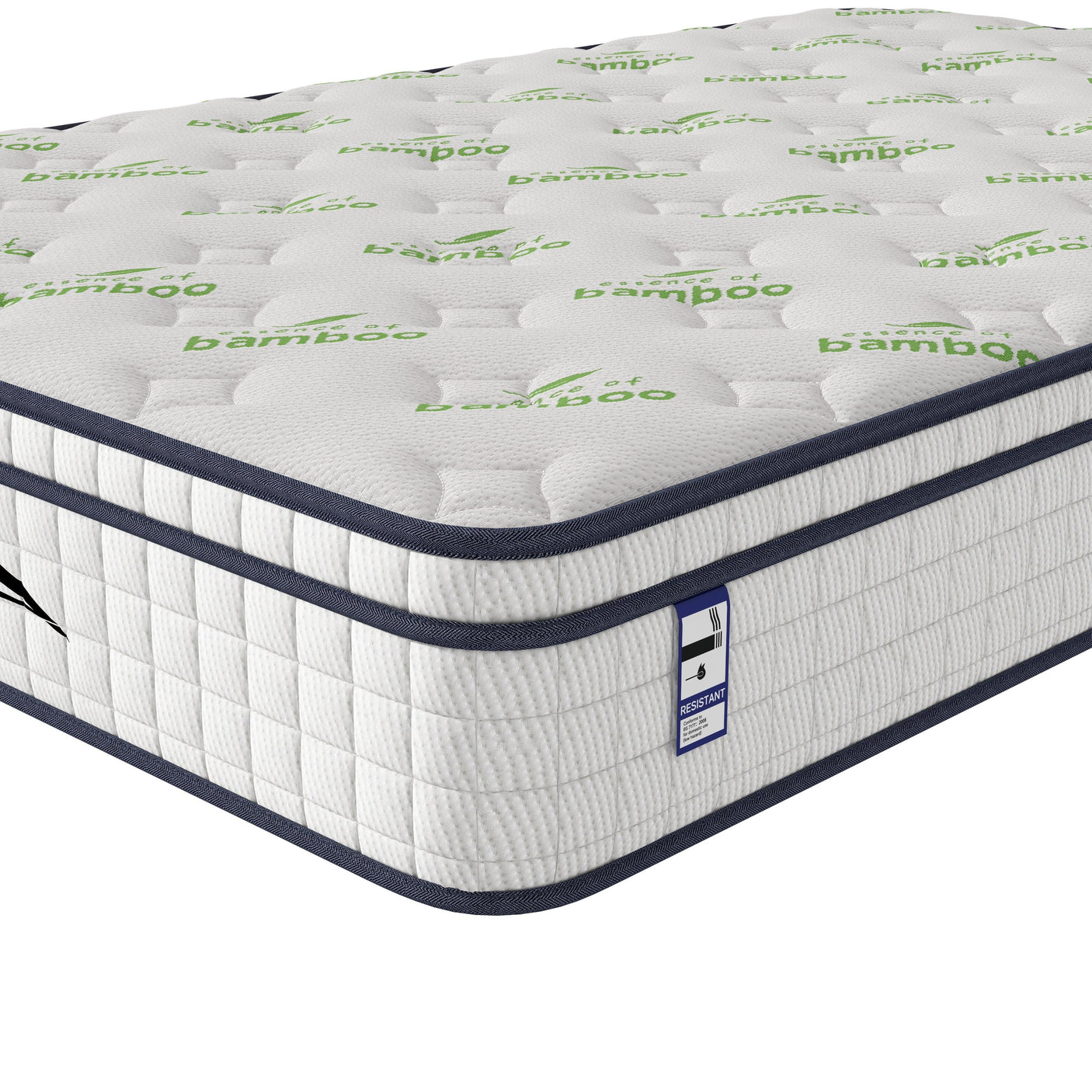 White bamboo mattress with quilted top and green leaf pattern, close-up corner view