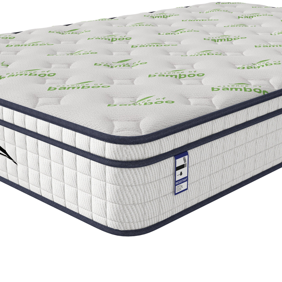 White bamboo mattress with quilted top and green leaf pattern, close-up corner view