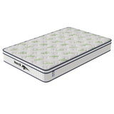 Bamboo memory foam mattress with white quilted cover and green bamboo logo, angled view