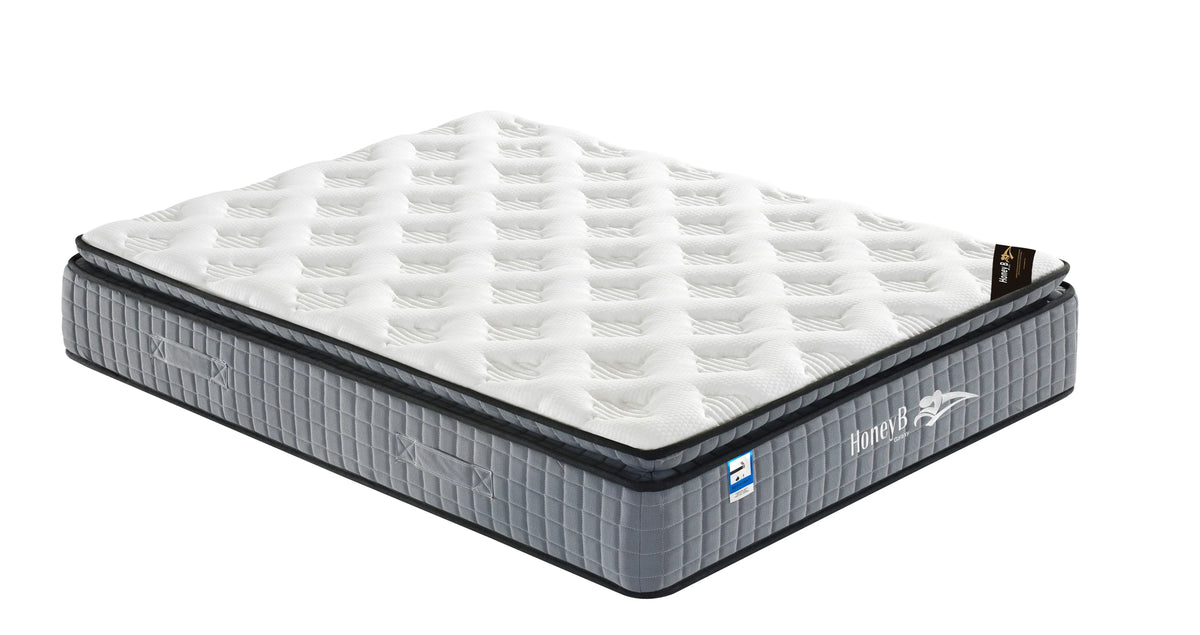 Double mattress with white quilted top and grey fabric sides, corner angle view
