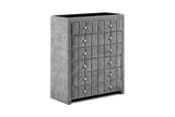 Grey fabric chest of drawers with tufted front and silver knobs, angled view