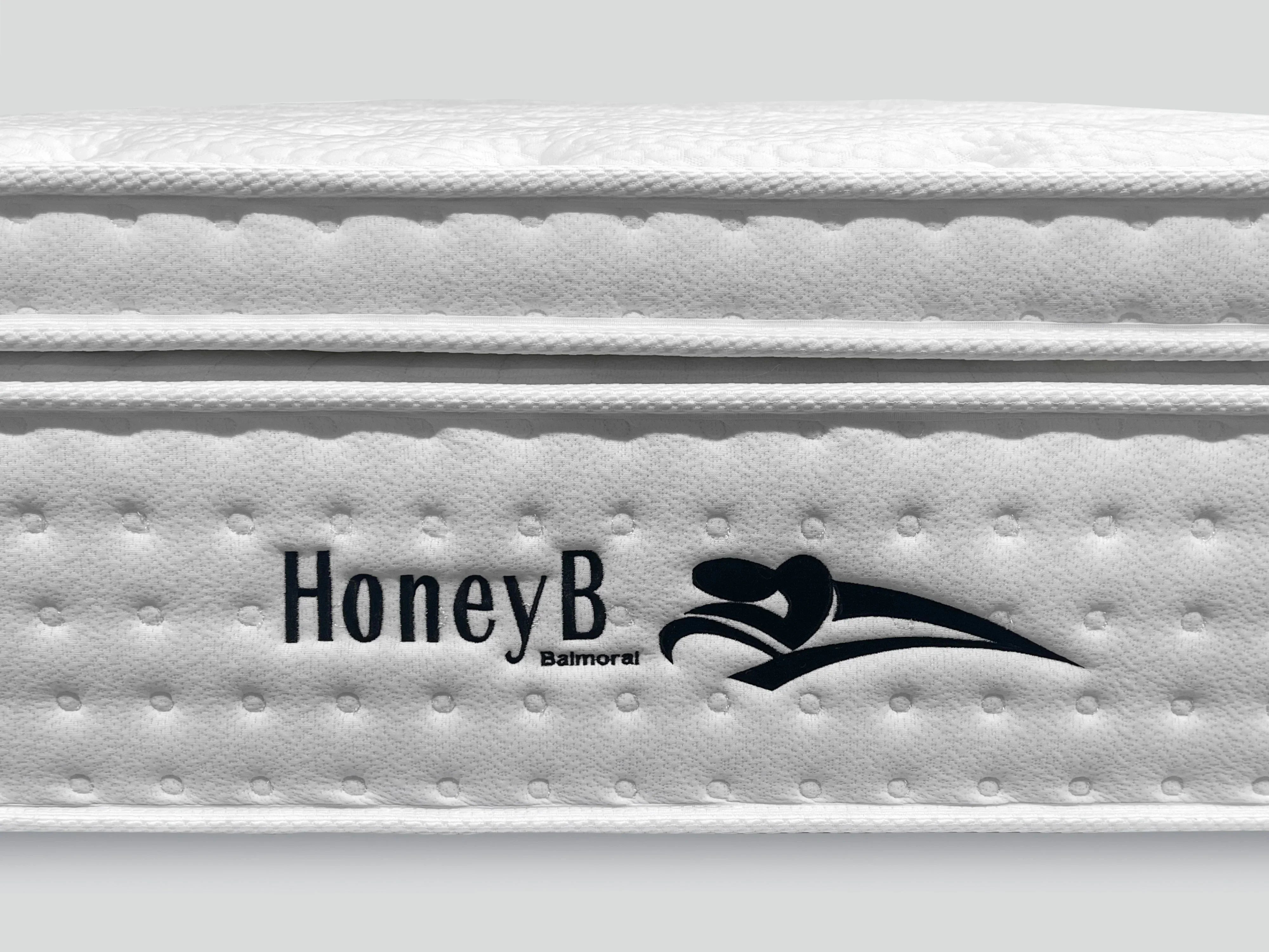 White quilted mattress side with HoneyB Balmoral logo and textured detailing