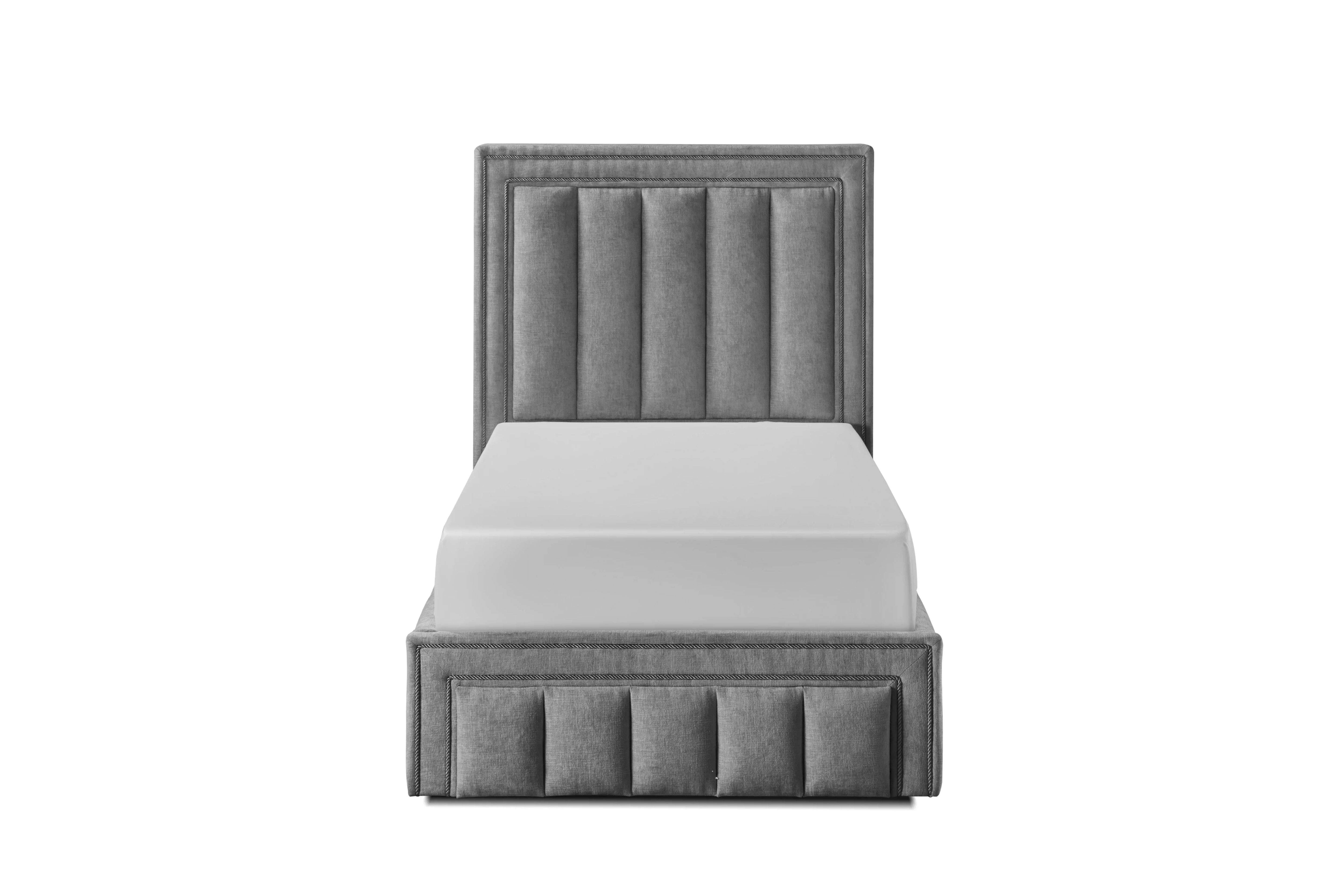 Grey upholstered single bed with vertical panel headboard and low footend