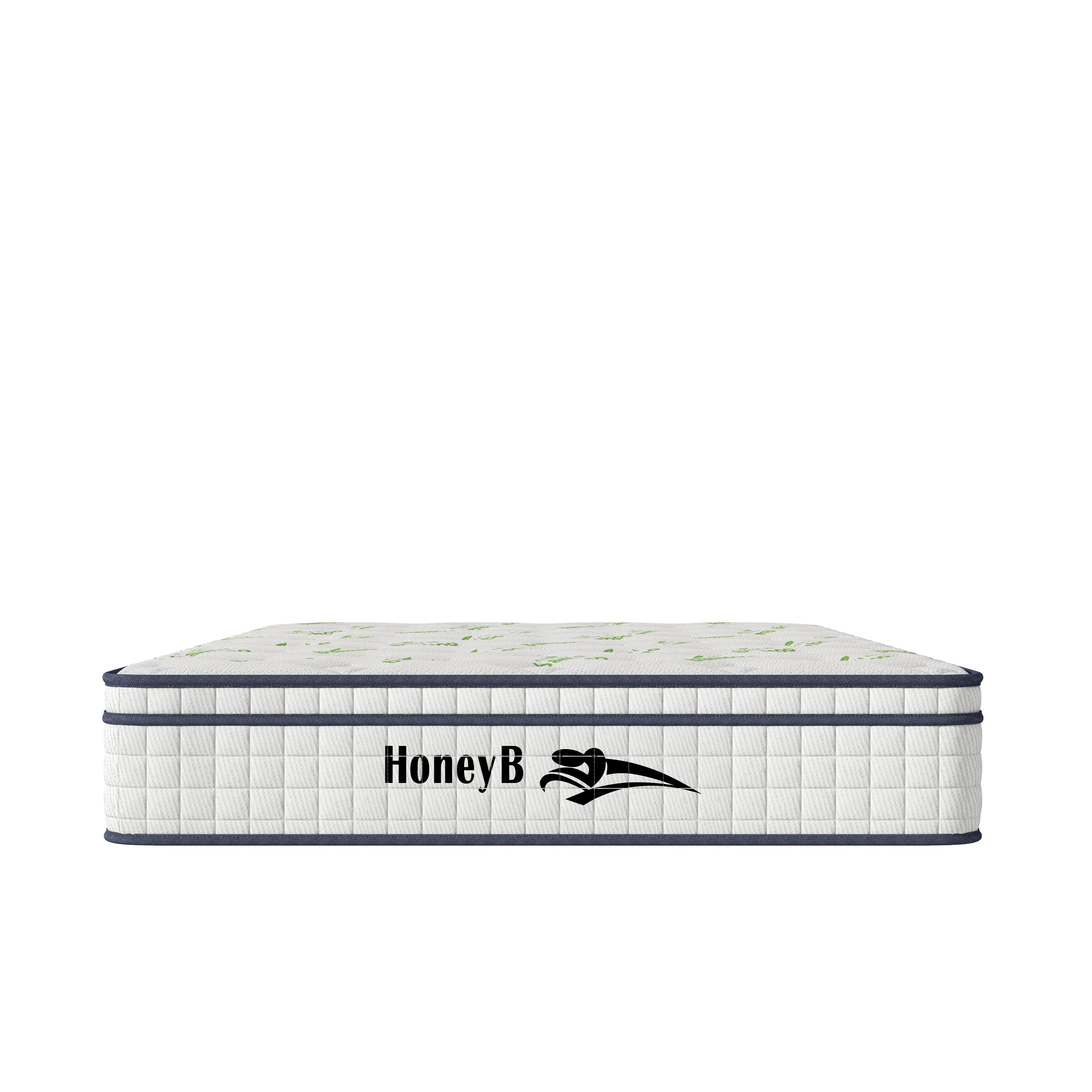 Hybrid mattress with white quilted sides and green pattern top, HoneyB logo at front