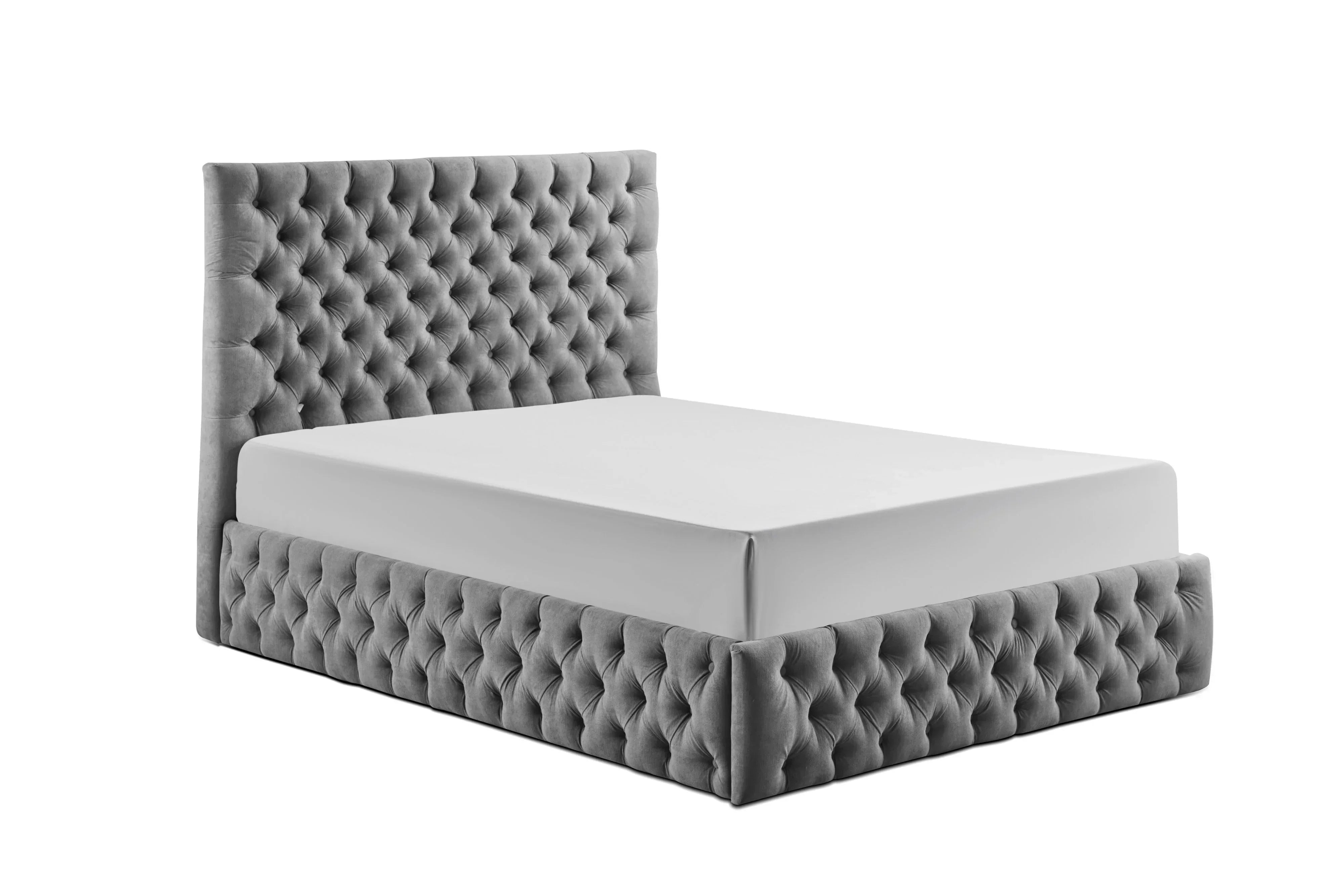 Grey velvet bed frame with deep button tufted headboard and base, angled front view