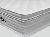 White quilted mattress with pillow top and stitched side detail
