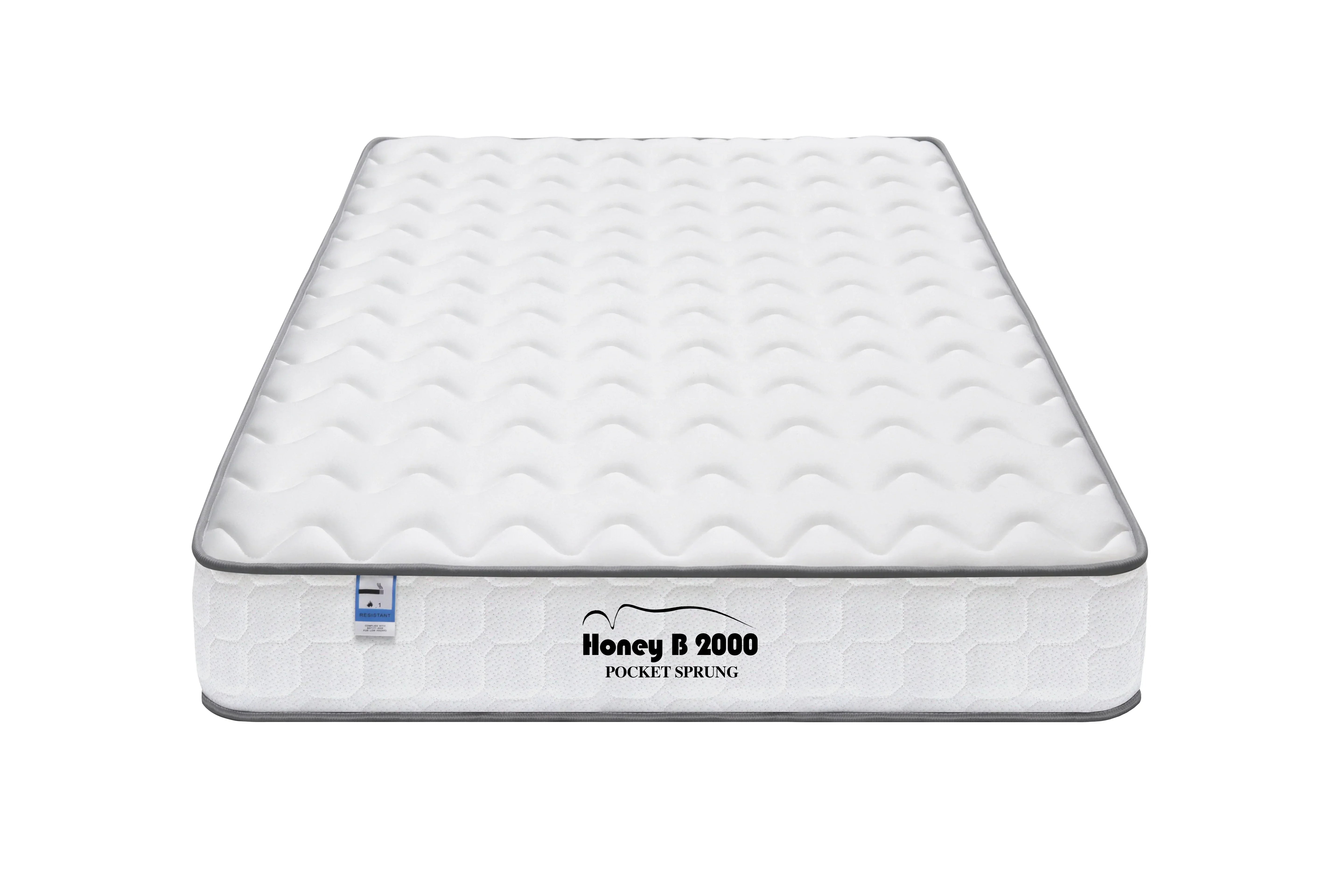 Pocket sprung mattress with white quilted cover and grey trim, front angle view