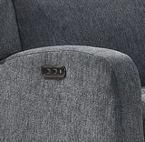 Close-up of a dark gray textured fabric armrest with a small black control panel featuring white buttons.