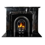 Black marble fireplace with arch detail and chrome fire grate featuring a burning flame