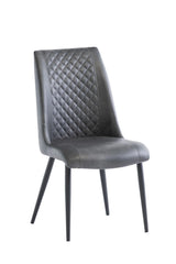 Grey upholstered dining chair with diamond stitching and black metal legs
