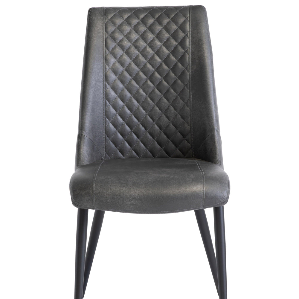 Grey faux leather dining chair with diamond stitched back and black tapered legs, front view