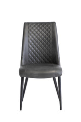 Grey faux leather dining chair with diamond stitched back and black tapered legs, front view