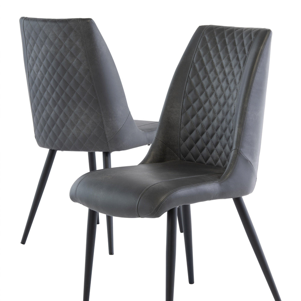 Grey dining chairs with quilted backs and black metal legs, angled front and rear view
