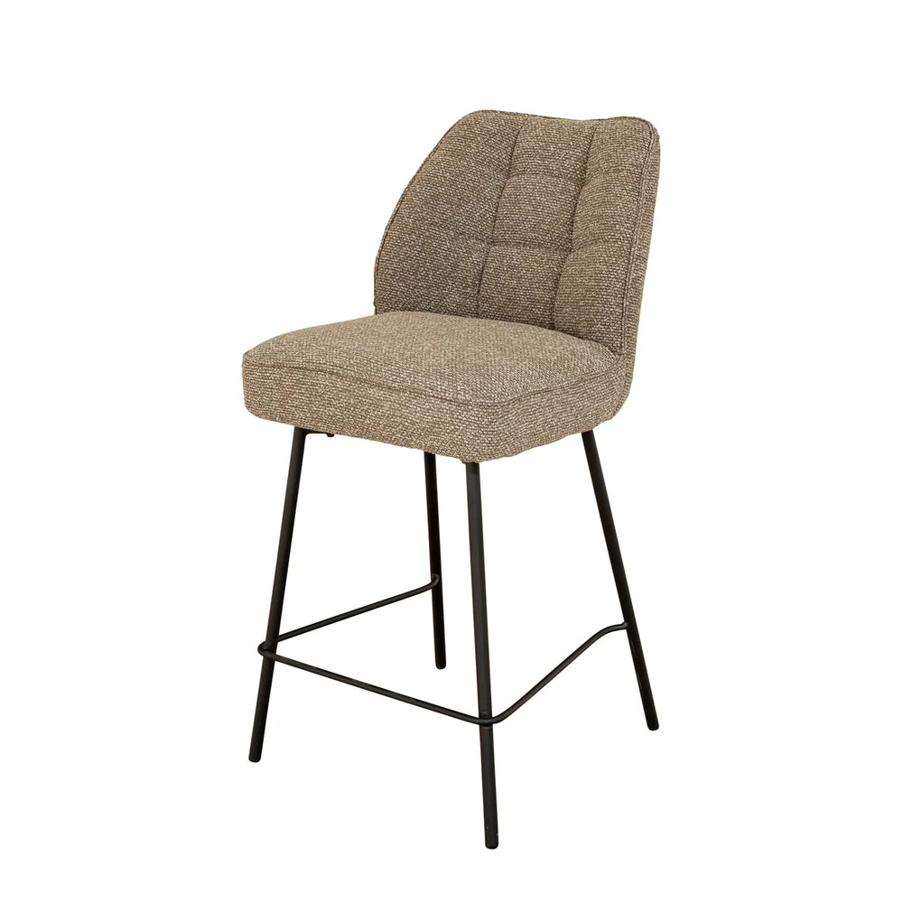 A single upholstered bar stool with a tufted backrest and seat cushion in a textured taupe-beige fabric, supported by slim black metal legs, shown on a plain white background.