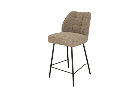 A single upholstered bar stool with a tufted backrest and seat cushion in a textured taupe-beige fabric, supported by slim black metal legs, shown on a plain white background.