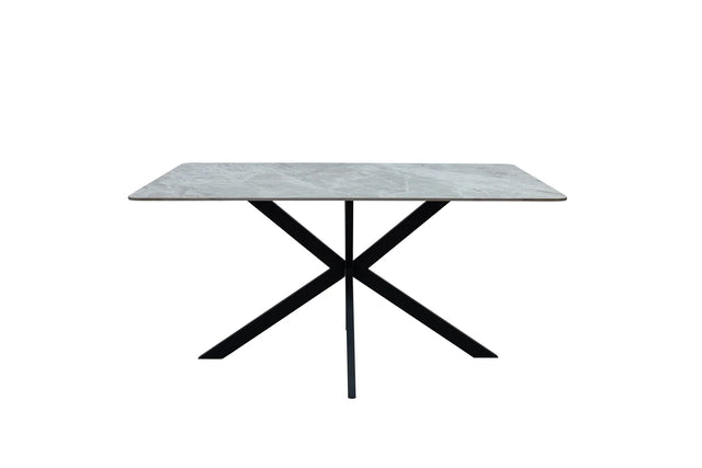 A rectangular dining table with a light gray marble-patterned top and a black metal X-shaped base, shown against a plain white background.