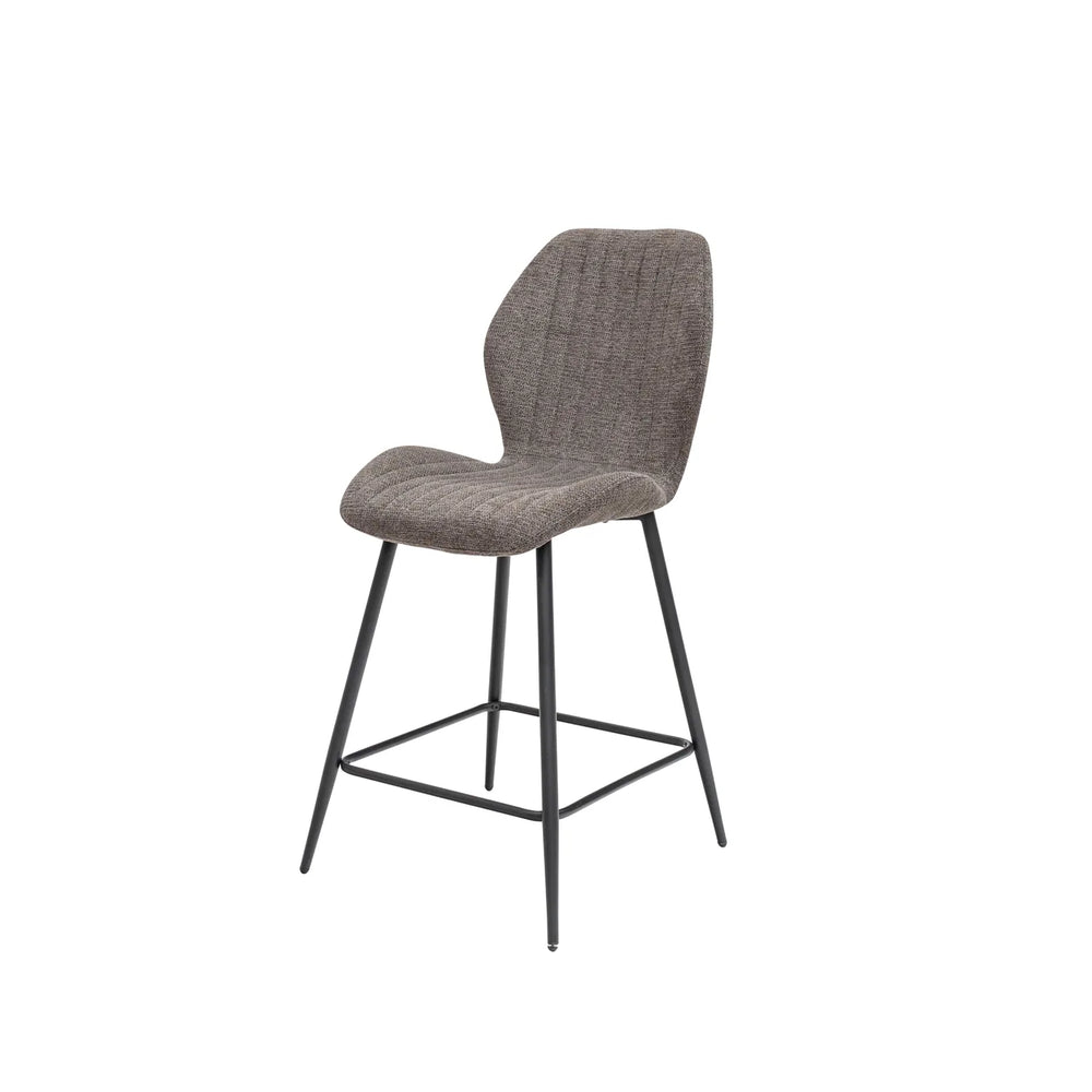 A modern bar stool with a textured gray upholstered seat and backrest, supported by a slim black metal frame with a footrest, shown against a plain white background.