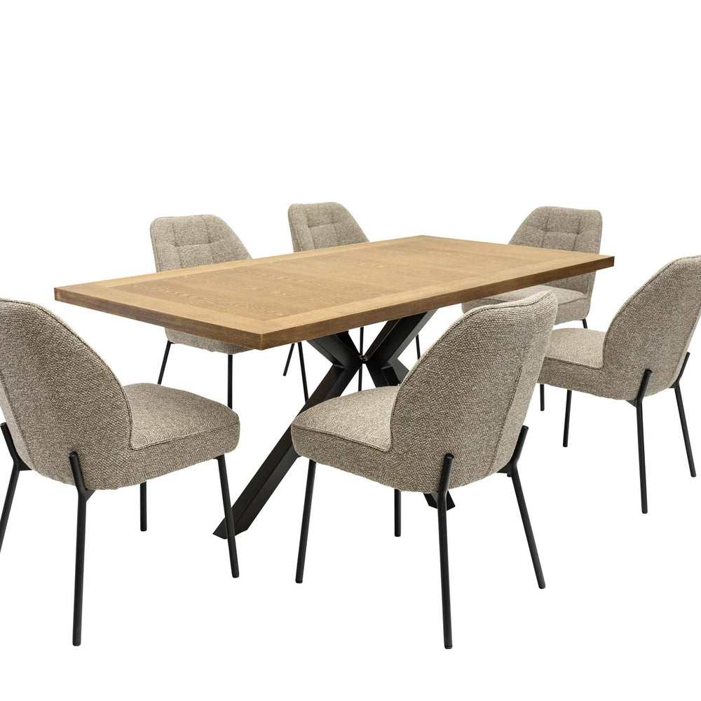 A 6-piece dining set featuring a rectangular light oak wood table with a black metal X-frame base, surrounded by six upholstered dining chairs in a textured beige fabric with black legs, shown on a solid white background.