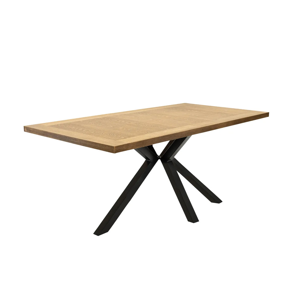 Wooden table with black metal legs on a white background