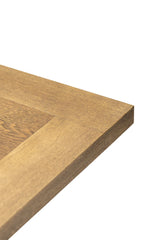 Close-up of a wooden surface with a visible grain pattern on a white background