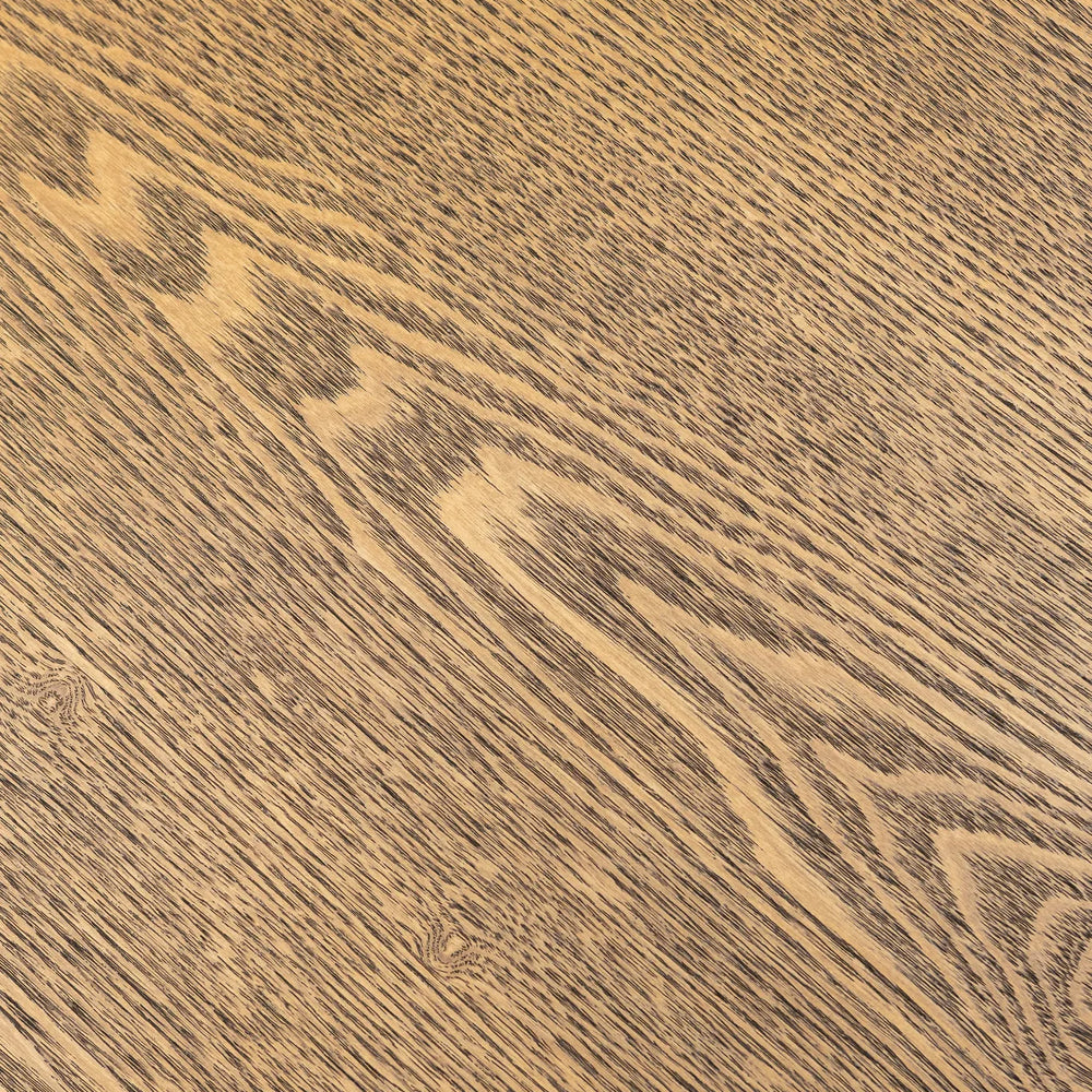 A close-up texture of a medium brown wood grain surface with natural light tan streaks and darker brown lines.