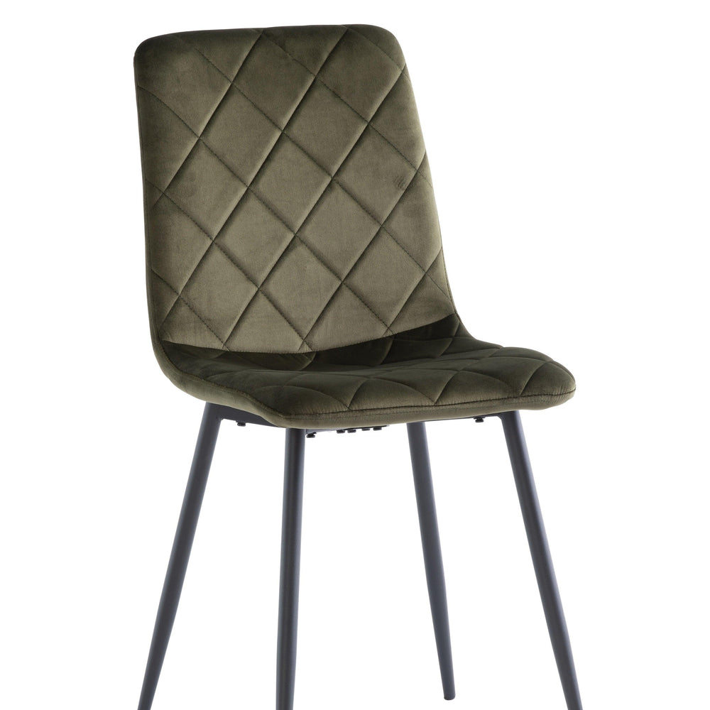 Olive green velvet dining chair with diamond stitched seat and black metal legs