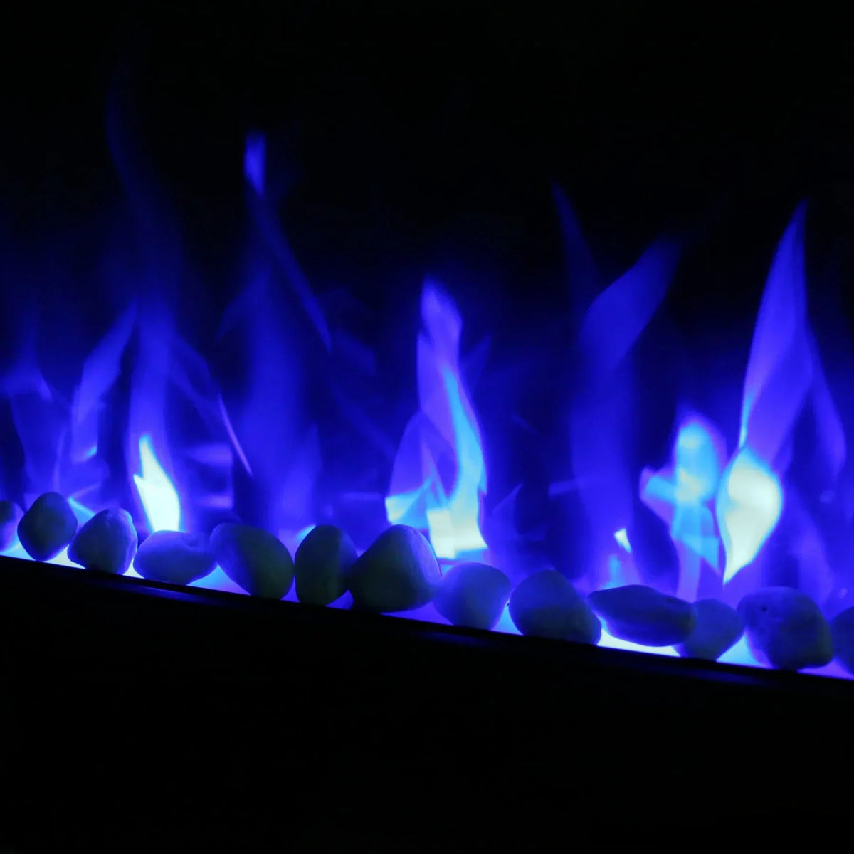 blue flame electric fire with decorative pebbles and vibrant lighting effect
