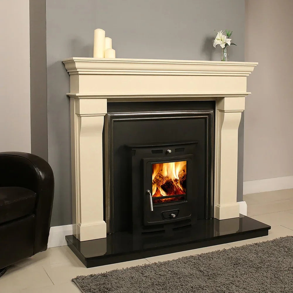 Cream fireplace with black wood-burning stove and visible flames on tiled hearth