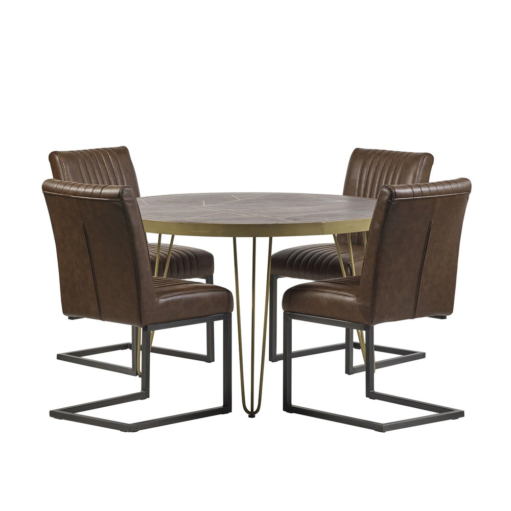 Dark gold round dining table made of solid mango wood with metal inlays