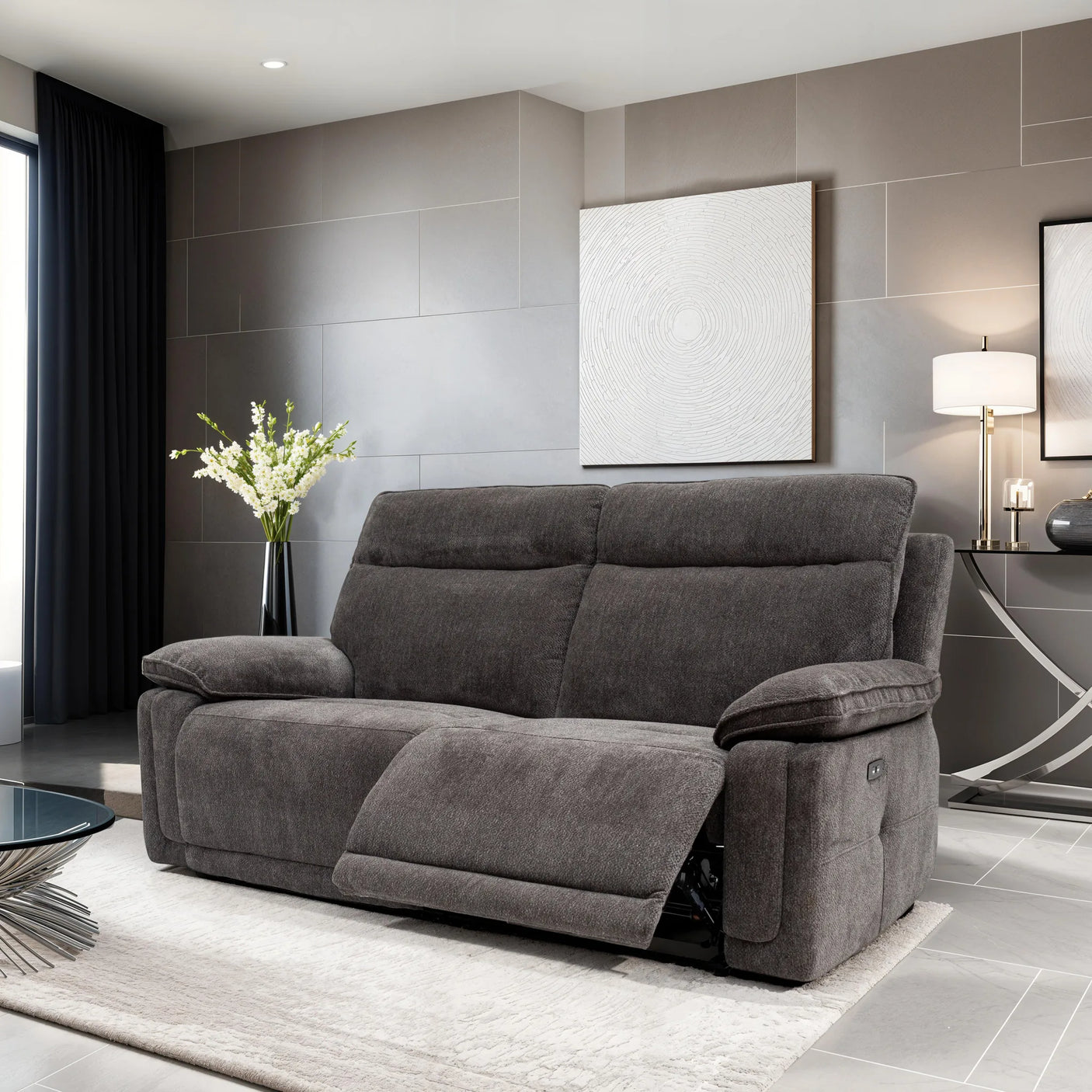 Gray sofa in a modern living room with gray walls and decorative elements.