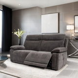 Gray sofa in a modern living room with gray walls and decorative elements.