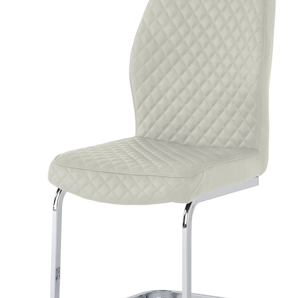 Cream dining chair with diamond quilted upholstery and chrome cantilever legs